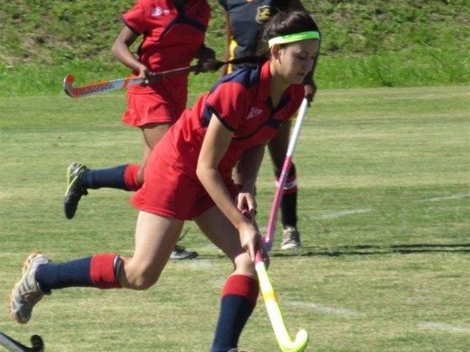 Fierce defence: Creston Girls first team hockey captain Denicke van der Merwe (foreground) dribbles with the ball while team member Fezeka Nzama (background) stays close at the recent Spar Southern KZN Regional clash between Creston and King Edward High.