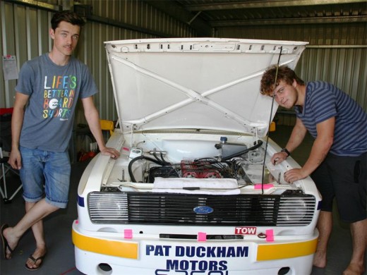 Big motor: James Bradnick (left) and Eric de Jager love the engine on this classic car.