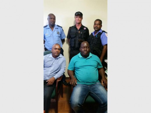 Crime talk: Working on ways to reduce crime in Marburg and the surrounding areas are (back, from left) X Nhlangulela, Jaco van der Westhuisen and Krinesh Naicker (Lazer 911) with senior ANC official, Selvan Chetty and Superintendent Jackson Mzindle from Hibiscus Coast Law Enforcement in front.