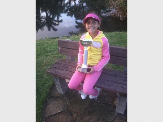 Nicely done: Simoné Ferreira(9) with the latest of her trophies, won at a SA Kids event held at Mount Edgecombe Country Club. She is preparing to hopefully play (depending on finances) in the Junior World Championships at Seven Lakes Country Club, North Carolina, not far from Pinehurst.