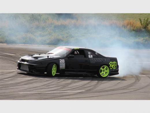Burning rubber: Drivers deliver an exhilarating performance at the Dezzi Raceway last Saturday.  5870vee