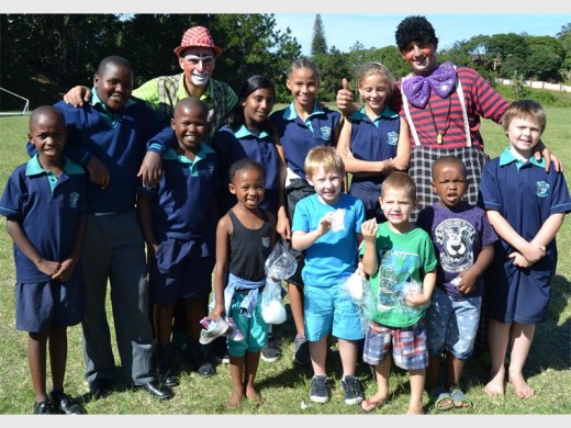 Brian Boswell Circus clowns ’Sparky’ (David Marais) and ‘Benji’ (Benjamin Lorenzo Berowsky) delight and entertain South Coast Academy pupils (back, from left) Lelethu Songunza, Phatso Mhone, Aluswe Danca , Keemia Gangan, Serina Gordon, Tiffany Hartley, (front) Amava Madikizela, Troy van den Berg, Nekoda O’Reilly, Landile Majola and Hayden Hall.