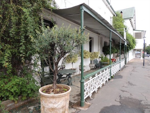 The shady verandah of Victoria Manor.
