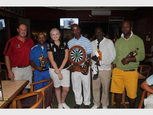 What a round: Chairman Jaco Venter (left) and his wife Nicci, congratulate the winners of the revived Margate Round Table golf day, sponsored by South Coast Hyundai and held at Margate Country Club. The winners are (from second left) Vusi Maphumulo, Elvis Khawula, Douglas Sima and Ronald Mtshaka.