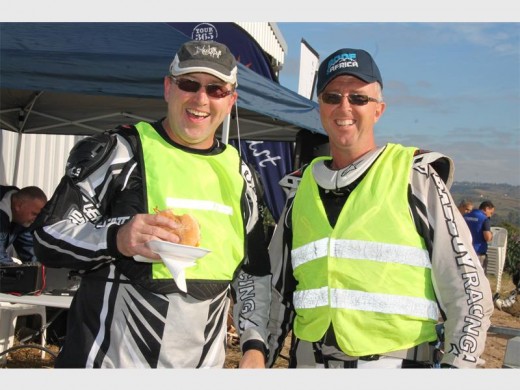 Having a bite before tackling the mountains are Hugh Strickland (left) and Louis Boshoff. 7114vee