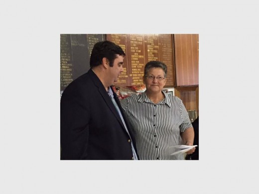 Thank you: BT King of South Coast Hospice receives a cheque for R11 750 from tournament sponsor Gavin van der Berg of Pristine Fisheries (Johannesburg) at the Moths Combined Ops Shellhole bowls day at Margate Bowling Club.