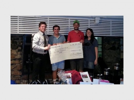 Thank you: Nedbank Oribi Plaza's Johnathan Vogt (left) hands over a cheque for R15 000 to Josh Billington and Jason Price for the Youthworx community centre in Shelly Beach. This was from Nedbank's Local Heroes' fund and the cheque was presented at the recent Youthworx golf day at Port Shepstone Country Club. (PLEASE CROP WOMAN ON THE RIGHT)