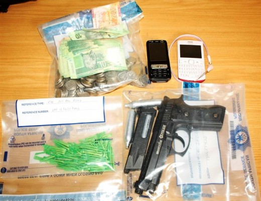 Police seized 127 straws of heroin, money and a gas pistol.