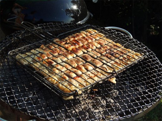 The amazing braai pie comes off the coals and is ready to serve.