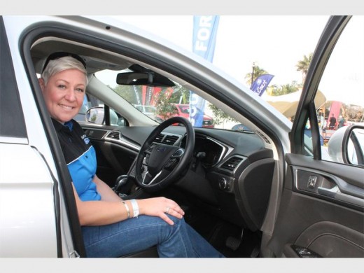 Trendy: Bronwyn Basson of County Ford takes a closer look at the Ford Fusion at the Lions' Show.