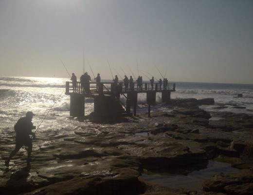 Fishing for shad on Uvongo pier.