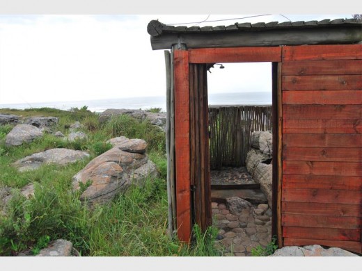An outdoor shower with a view.