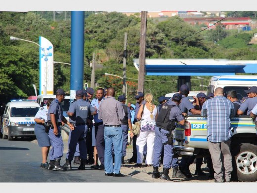 Close eye: The SAPS has had to monitor the situation at the Port Shepstone rank on numerous occasions to ensure that commuters are safe from the taxi violence.