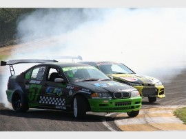 Smoking hot: Brendan Puren and Shane Gutzeit do battle on the track. 2391vee