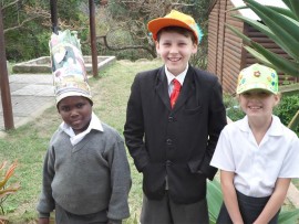 Andile Mbutho (left), Levi Vermaak and Leah Vermaak from Hibberdene Academy had a lot of fun creating hats to wear on Spring Day.