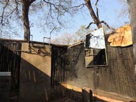 The open-air camp shower, once notorious for its cold shower, now has a hot water system.