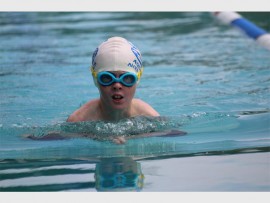 Almost there: Tristan Sparkman (9) of Umtentweni displays impressive concentration and endurance.