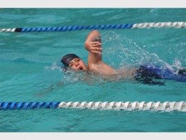 Going well: Camden Wijburg (11) of Umtentweni powers through the water.