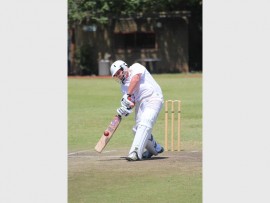 Sweetly struck: Chad Laycock belts one back over the bowler's head. The 12-year-old made a classy 24 not out.