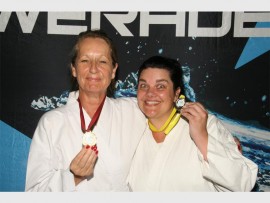 Medal winners: Natalie Rennie (left) and Karin Lehmann are proud to have received medals at the champs. 9080
