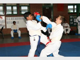 Fight mode: Seen in action during the championships are Jehryn Moonsamy (left) and Thinus Bester. 9380