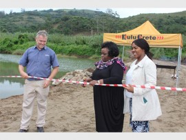 Ready to go: Opening the Umzimkhulu river berm at St Helen's rock plant on Thursday this week  are (from left) KuluCrete south coast director, Kevin Stott, Ugu District Municipality Mayor Cllr Ntombifikile Gumede and Ugu General Director Lungile Cele.