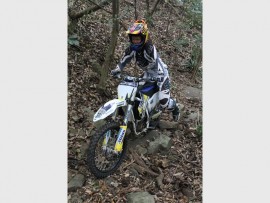Off-roader: Blake Gutzeit tackles the rocky terrain.