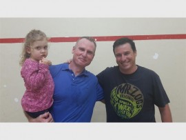 Plate power: Martin de Villiers (left), with his daughter Gemma, after his Douglas Mitchell plate final win over Bruce Cunningham.