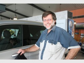 Wide variety: Karl Filter of Shelly Beach checks out the large range of vehicles on display. 0420vee