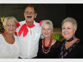 Mexican bunch: Friends (from left) Sue Ferguson, John Swanepoel, Erica Long and Lorie van der Westhuizen enjoy a fun evening at the Margate BC 'Toys for Joy Mexican Night' last Saturday.