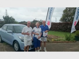 On the right road: Winning the Suzuki sponsored mixed trips at Southport Bowling Club are (from left) Peter Clark with Pat and Peter Maggs.