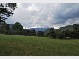 The camping area is ringed by mountains.