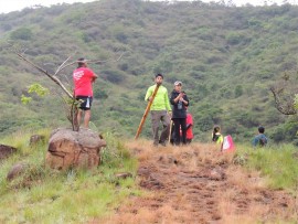 Walkers rest after negotiating one of the steep inclines along Umbango River Conservancy's Tandele Trails