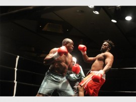 I got this: Mugaben Mudimba (left) throws a punch at Maitre Motratina at the 'War on the Shore 2' boxing tournament held at the Wild Coast Sun on Friday last week.