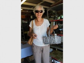 Craft lover: Anne Fryer, a regular visitor to the craft market, took a fancy to this lovely basket. img1669