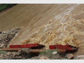 Falling: What is left of the berm used to prevent sea water from contaminating river water looks like it will not hold for much longer.