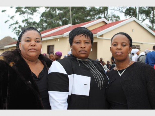 Mourners: Neighbours of Bazooka attend his burial service held at Mdatya near Xolobeni last Saturday. They are (from left) Du Mzize, Nolukhanyo Dayimane and Nosicelo Shweni.