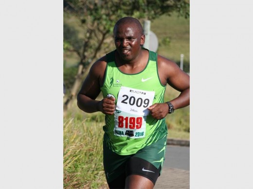 Let's go: Kenneth Dladla from the South Coast Community Development Committee gets to the finish line. 0880vee