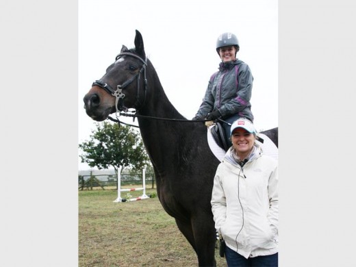 Warm welcome: Organiser of the event Cheryse Wikstrom, on  Royal Thunder, welcomes Jodi Pieters. 1097vee