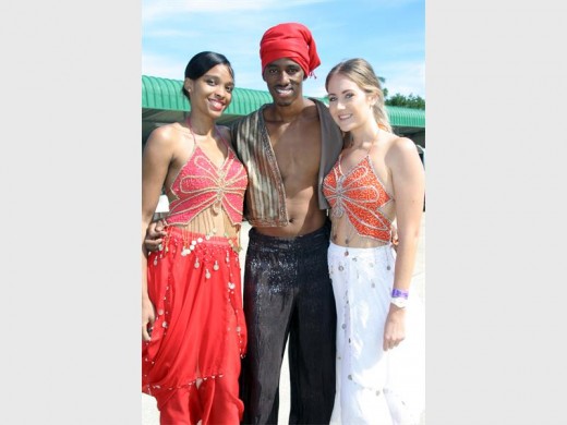 Hello there: Welcoming guests to the festival are (from left) Ntokozo Ndlovu, Nkanyiso Sibiso and Paige Pienaar. 2218vee