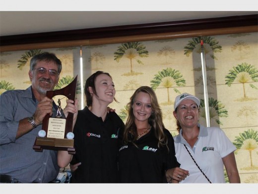 Best (un)dressed: The fiercely contested Plant Consultants Trophy for the most popular seconding table at the Master Builders' Association golf day at the Wild Coast Sun on Friday went to P&G Construction. Thys Blom presents the floating trophy to Megan Fourie, Angie Sykes and Tracy Hayden.
