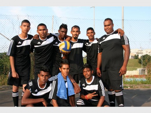 All set: The Keshivan team, togged up for their match, are (back, from left) Tevin Moodley, Pravesh Mahendra, Faryaadh Khan, Dino Manilal, Ashlyn Manilal and Kivesh Baldrash with Justin Nair, Vishay Singh and Damion Naicker in front. 3013vee