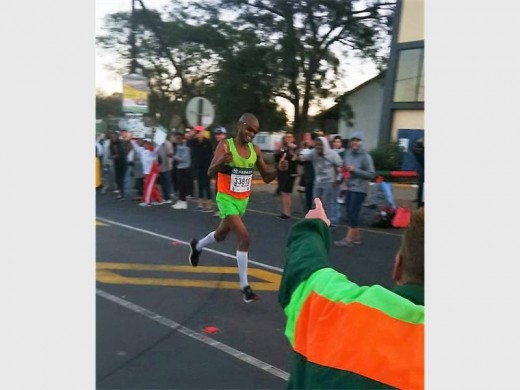 Fame, for a while: Michael Mzobe, a half-marathon specialist, led the race (in the colours of the South Coast Striders) for a while, before deliberately quitting at the 30km mark. PHOTO BY HANNAH WRIDGWAY