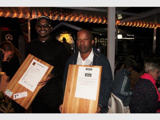 Great golf: Phiwa Mkhoma (left) and Koko Zithumane take first place in the Tweni Crime Watch golf day at Port Shepstone CC last Saturday.