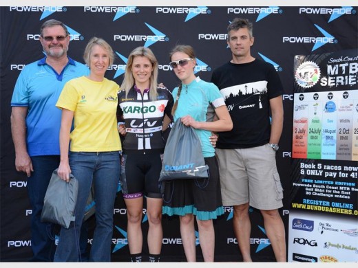 Champs: Managing director of San Lameer, Pine Pienaar (left) and owner of Giant South Coast Wayne Tarr (right) congratulate the17km MTB women's winners Nataschka Mowat, Hayley Smith  and Amy Green. SUBMITTED