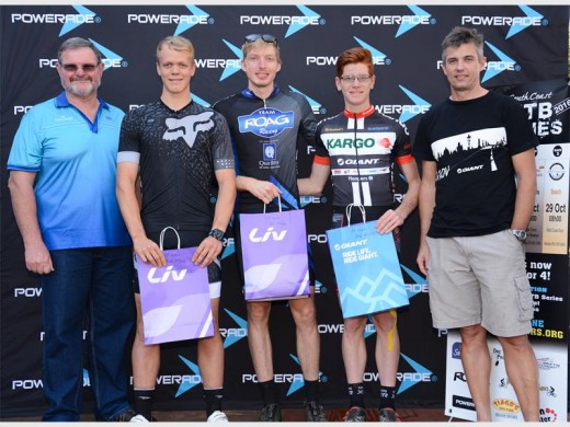 Well done: Managing director of San Lameer, Pine Pienaar (left) and owner of Giant South Coast Wayne Tarr (right) congratulate 17km MTB men's winners, Blake Gutzeit, Jedson Tooms and Cayde Muldgon. SUBMITTED