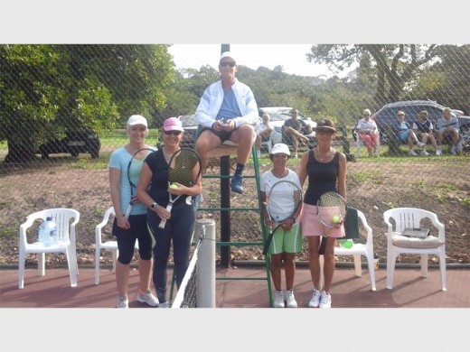 Keeping it friendly: Pauline Lee (left) and Nicky Momberg beat Zinnia Freitas and Meryl Simonsen in the final of the women's doubles at Southbroom Tennis Club.