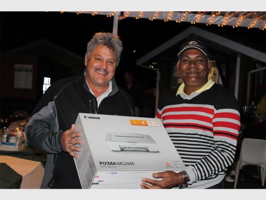 On form: Tino Kankowski (left) congratulates Abel Yeeranna (and his missing team) on winning the Wozani Berg Gasoline golf day at Port Shepstone CC last Saturday.