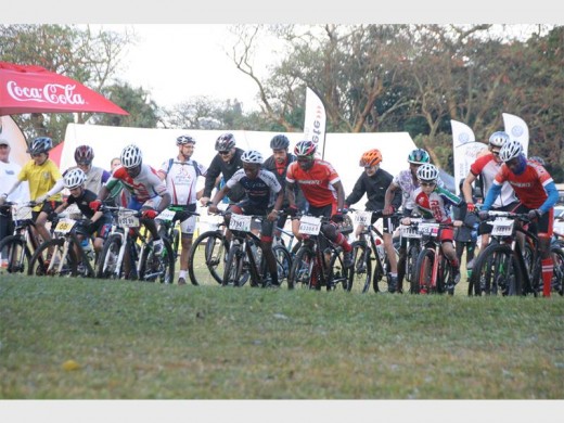 Confident riders: Cyclists from the Burry Stander Foundation (from left) Qiniso Cele, Lindo Kuhie Mbhele, John Cele and Nduduzo Ndlovu in great spirits in spite of the rainy weather. 7523vee