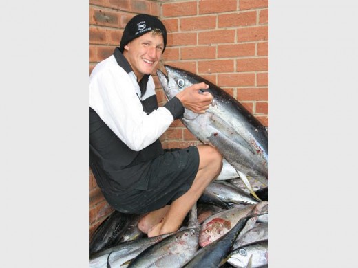 Whopper: Shelly Beach angler Liam Taljaard, captain of the KZN Black team, with his catch of the day.  7828vee